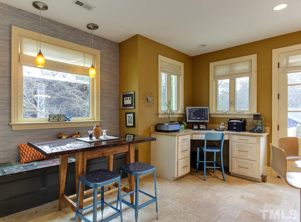 2711 Barmettler Street Raleigh, NC 27607 - Photo 10 of 25 a view of a workspace with furniture and window