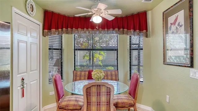 a view of lake with green yard