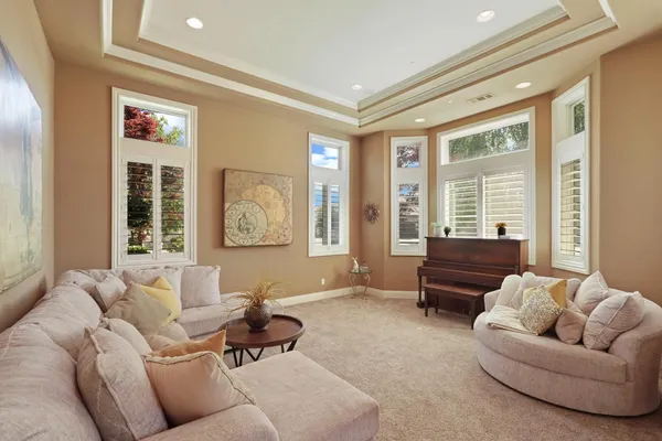 a kitchen with stainless steel appliances granite countertop a sink a stove and a wooden floors