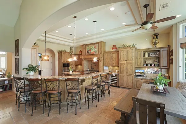 a bedroom with a bed and a desk