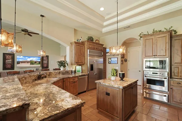 a view of a swimming pool with a lounge chairs