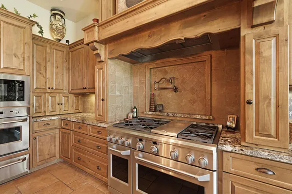 a living room with furniture ceiling fan and a rug