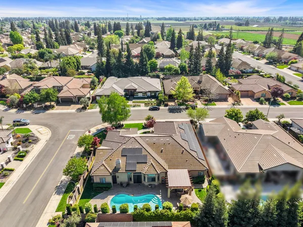 an aerial view of a city with lots of residential buildings