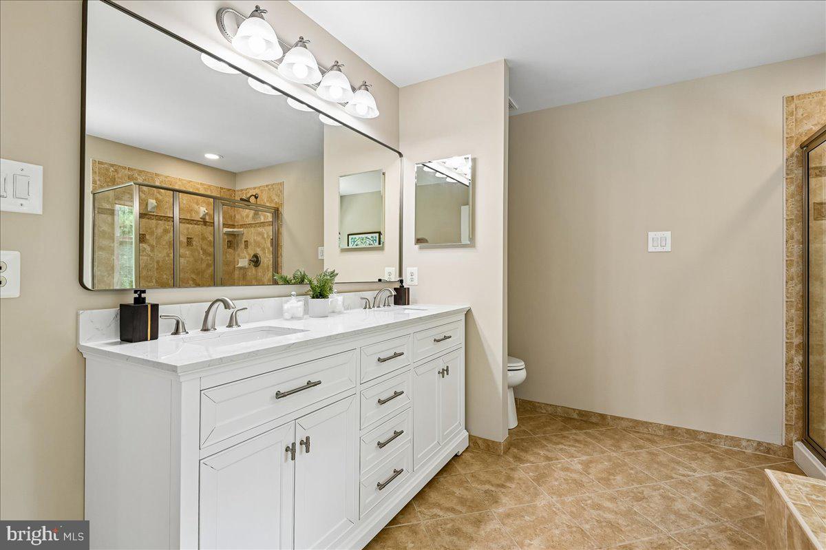 603 Queenstown Road Severn, MD 21144 - Photo 46 of 85 Elegant bathroom with modern finishes.