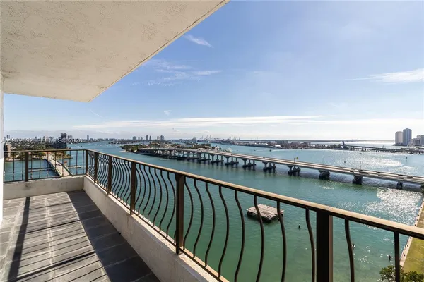 a balcony with an ocean view