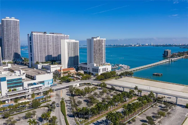 a view of a city with tall buildings