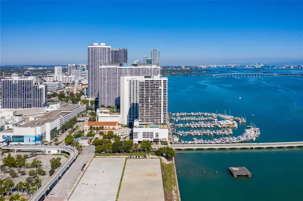 a view of a city with tall buildings