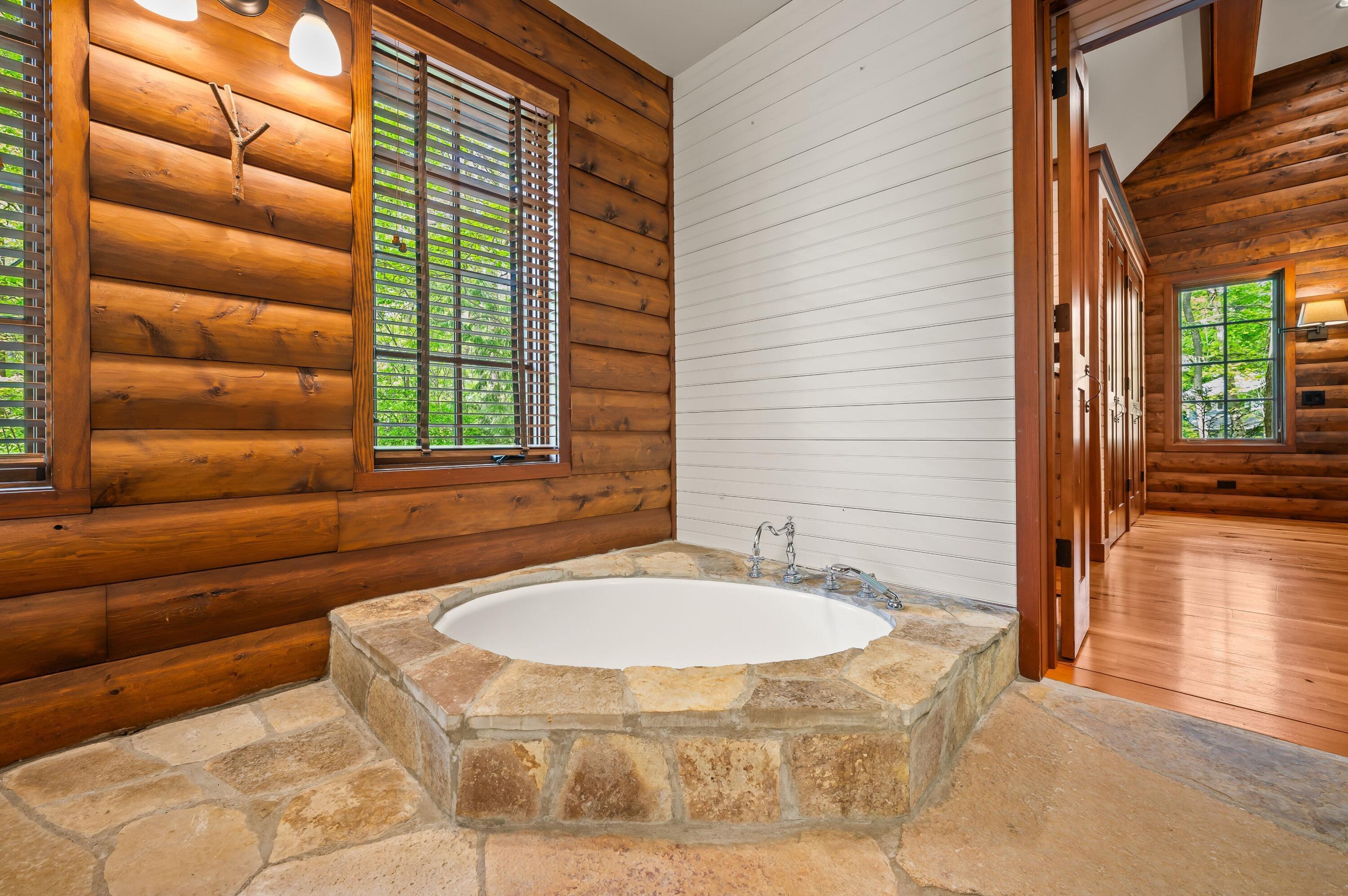 14657 Lakeshore Road Lakeside, MI 49116 - Photo 25 of 71 Primary Bath with Stone Flooring