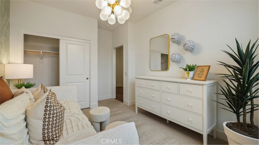 1803 Lychee Street Fullerton, CA 92833 - Photo 20 of 23 a bedroom with a bed and a couch