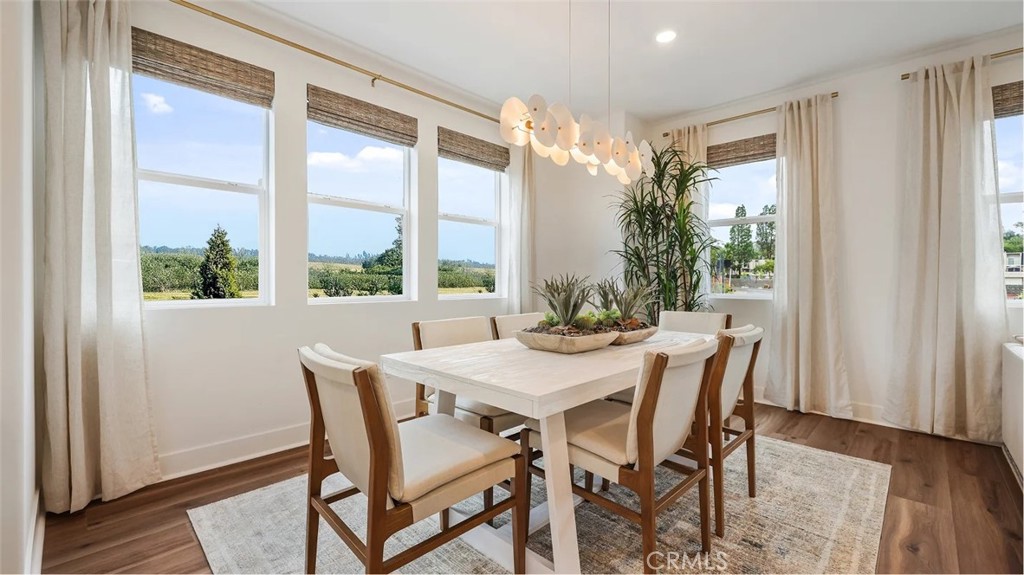 1803 Lychee Street Fullerton, CA 92833 - Photo 6 of 23 a view of a dining room with furniture window and wooden floor