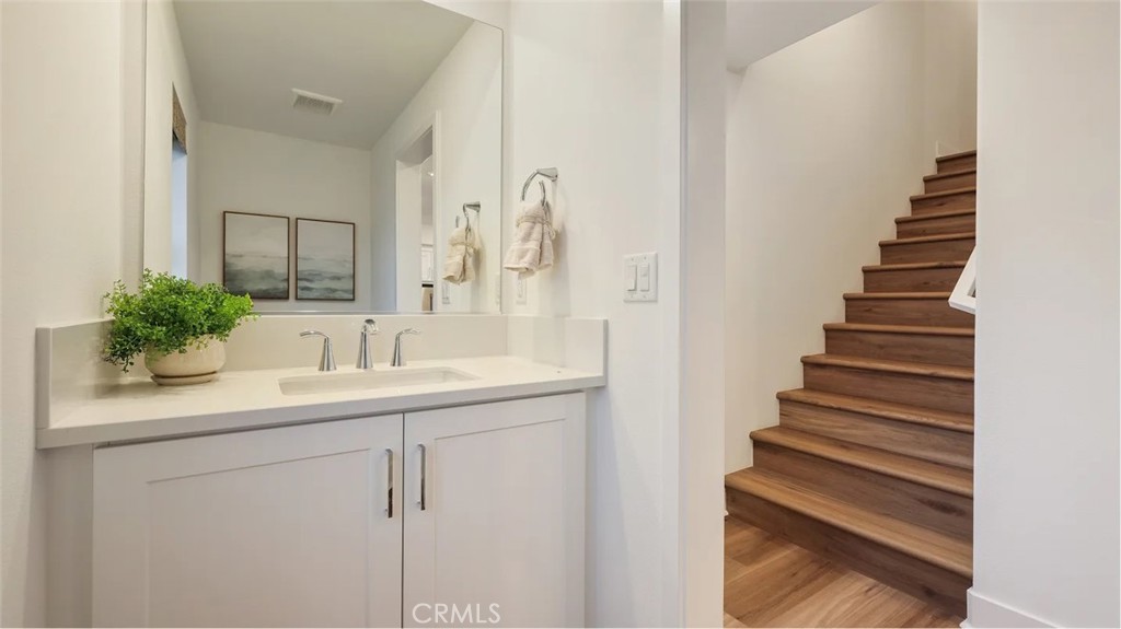 1803 Lychee Street Fullerton, CA 92833 - Photo 9 of 23 a bathroom with a sink and a mirror