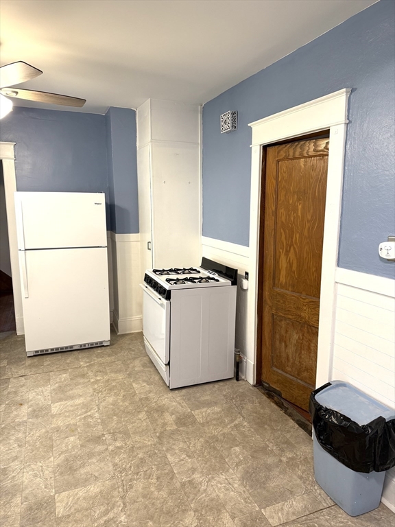 21 Westford Circle Springfield, MA 01109 - Photo 5 of 24 a view of kitchen with washer and dryer