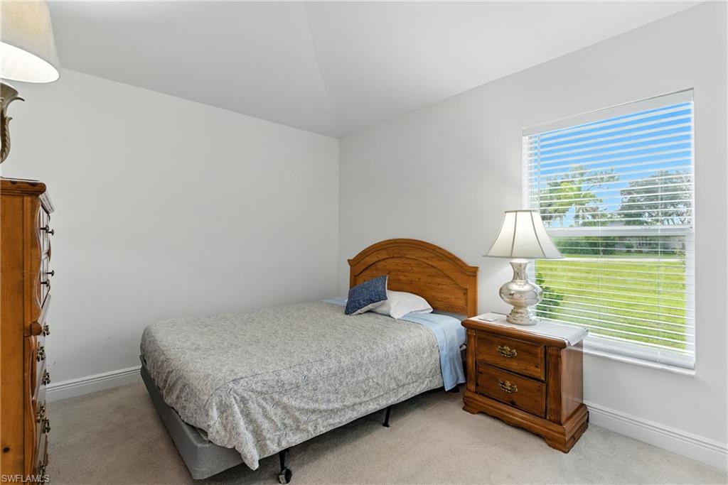 176 Venus Cay Naples, FL 34114 - Photo 27 of 50 Carpeted bedroom featuring baseboards