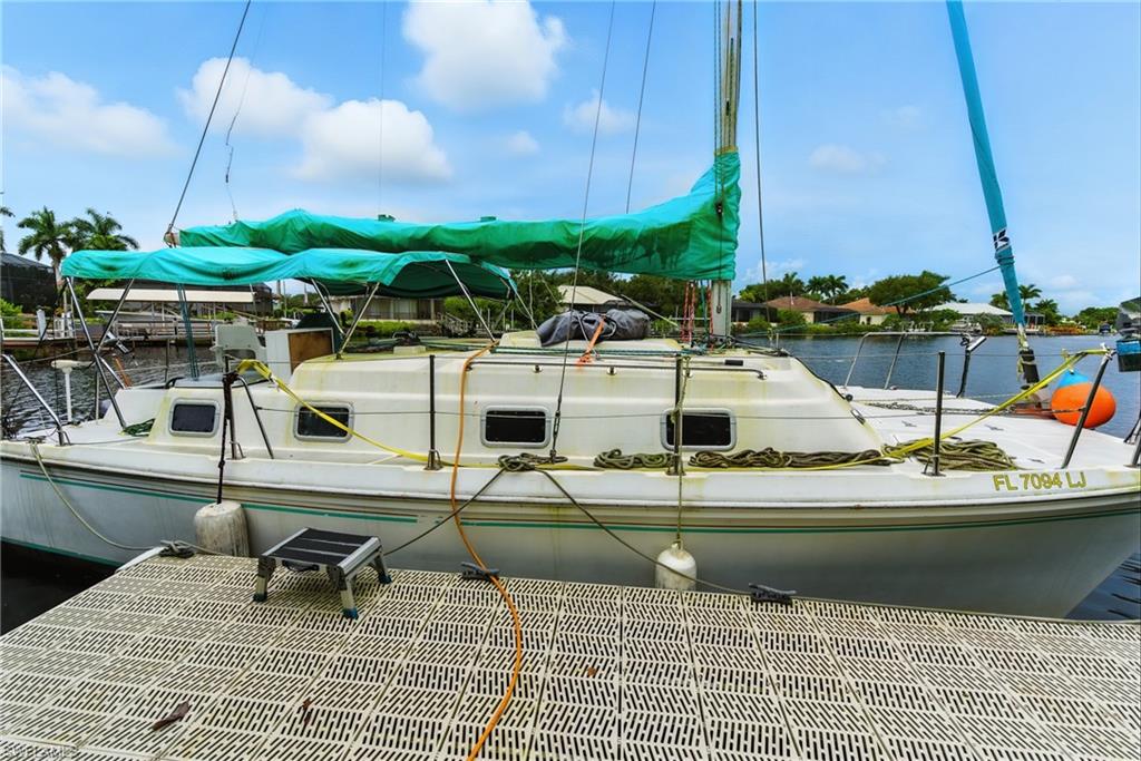 176 Venus Cay Naples, FL 34114 - Photo 3 of 50 Dock area with a water view