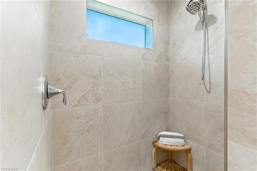 176 Venus Cay Naples, FL 34114 - Photo 36 of 50 Bathroom with a tile shower