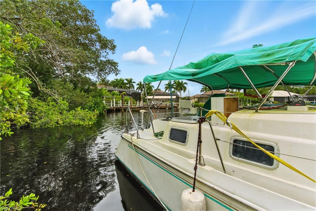 176 Venus Cay Naples, FL 34114 - Photo 5 of 50 Dock with a water view