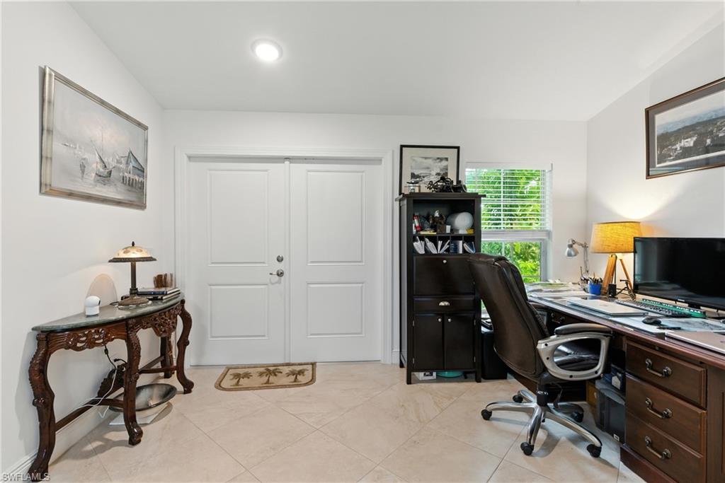 176 Venus Cay Naples, FL 34114 - Photo 7 of 50 Home office featuring light tile patterned floors
