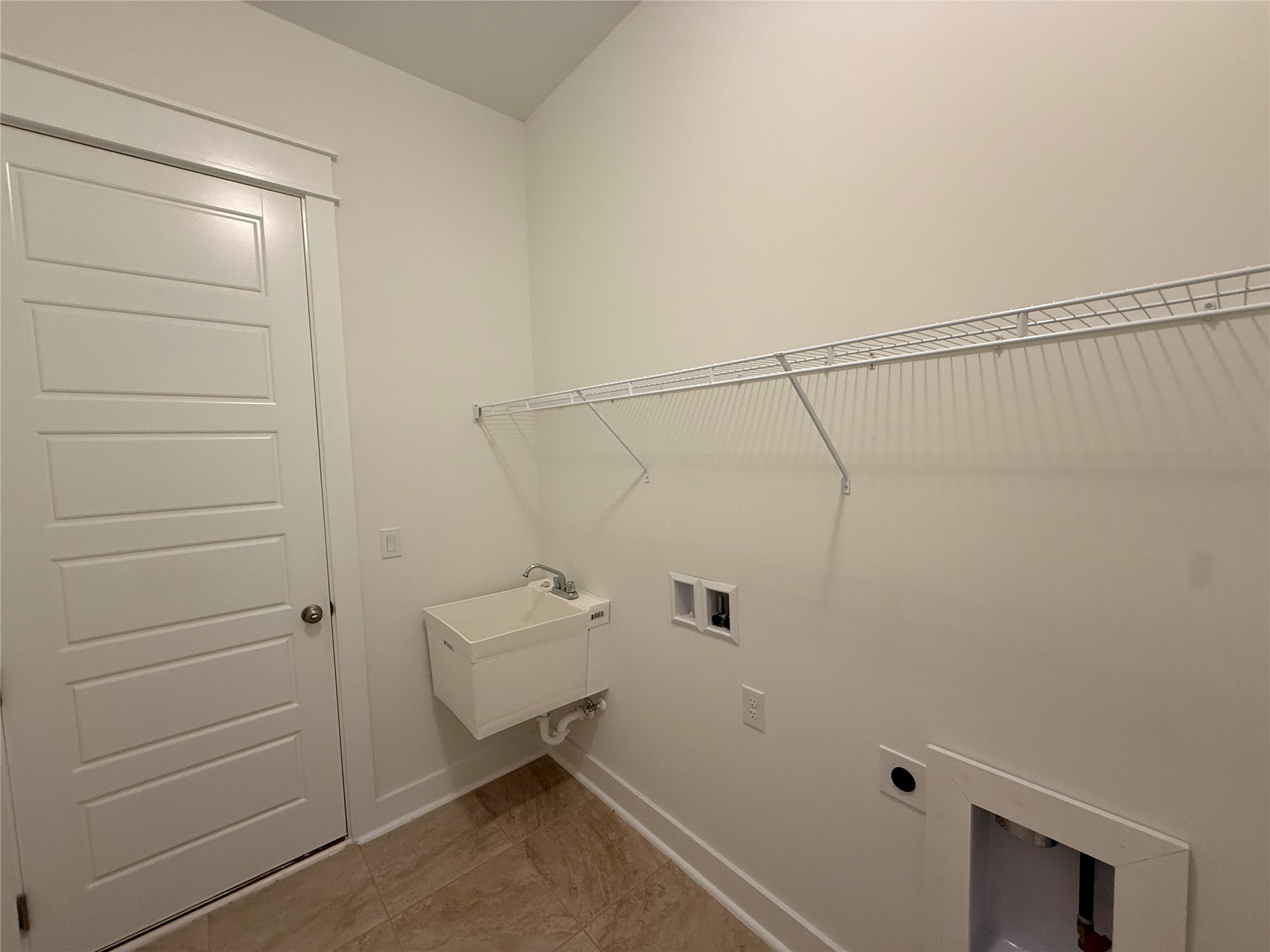 96130 Captains Pointe Road Yulee, FL 32097 - Photo 20 of 32 a view of storage and utility room with racks on the wall