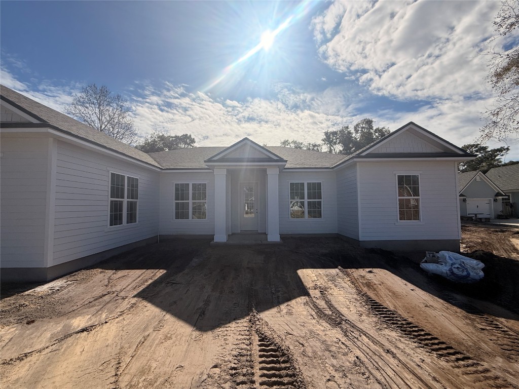 96130 Captains Pointe Road Yulee, FL 32097 - Photo 2 of 12 a front view of a house