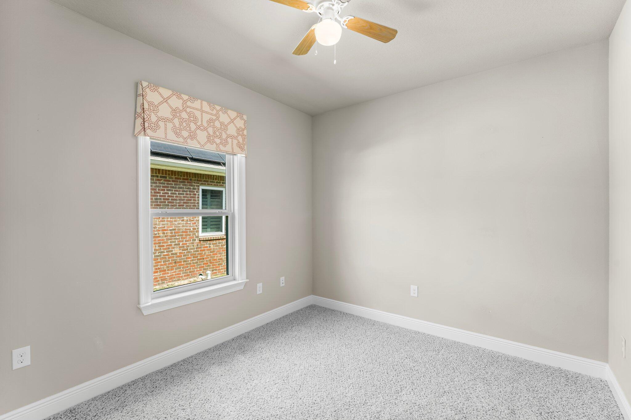 29 Buddy Lane Santa Rosa Beach, FL 32459 - Photo 13 of 47 an empty room with a window