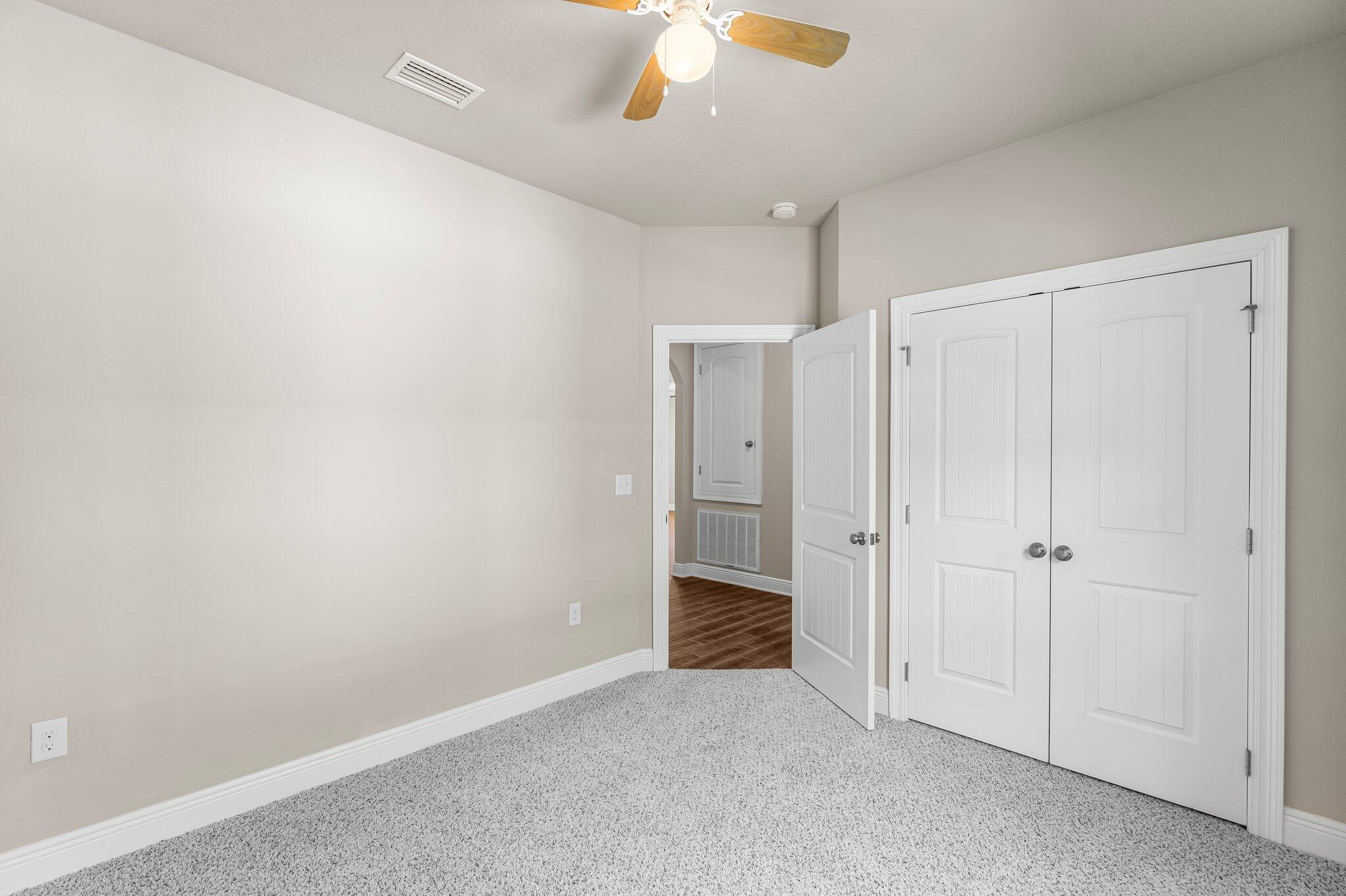 29 Buddy Lane Santa Rosa Beach, FL 32459 - Photo 14 of 47 an empty room with a ceiling fan
