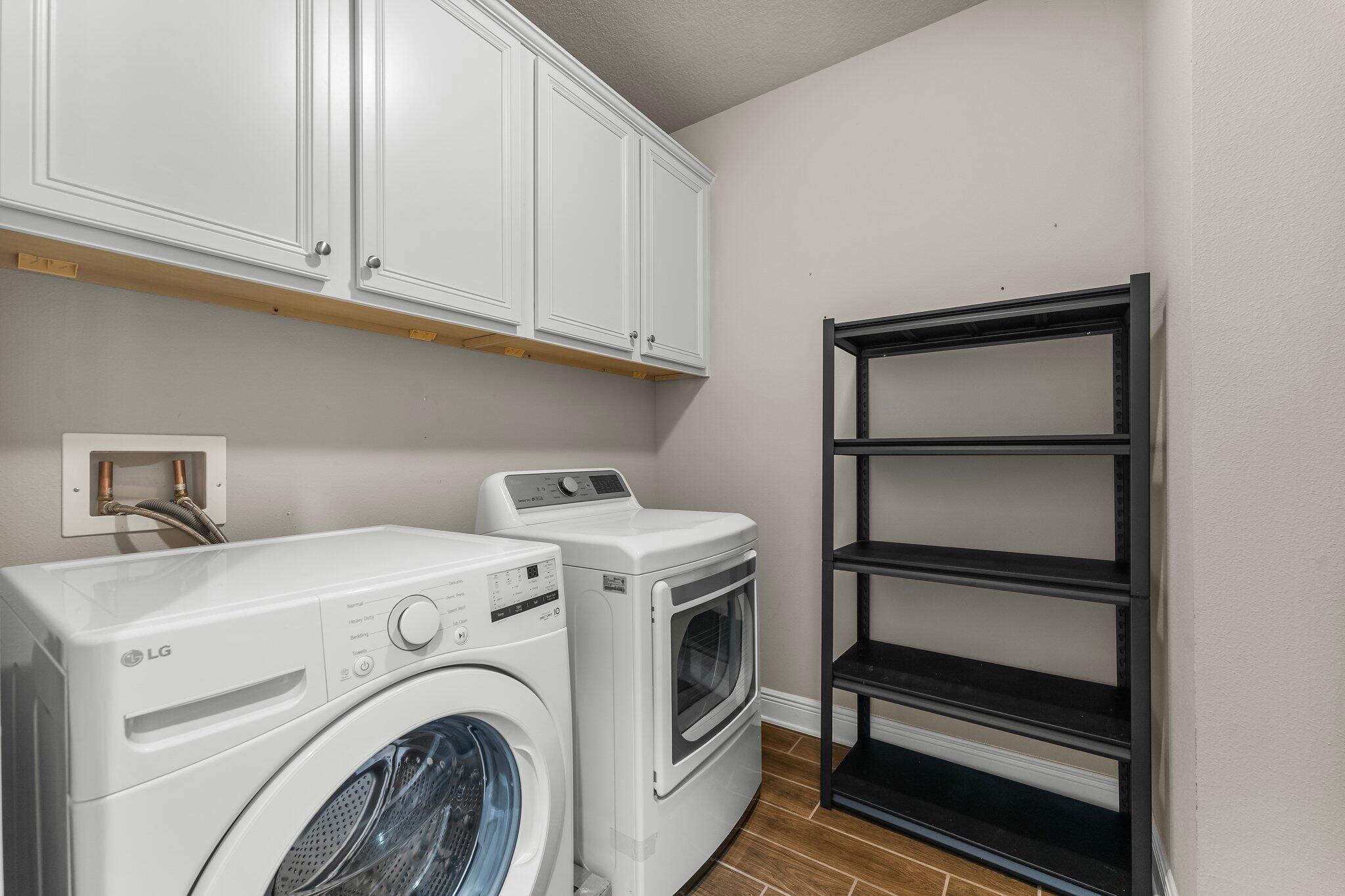 29 Buddy Lane Santa Rosa Beach, FL 32459 - Photo 25 of 47 a utility room with dryer and washer