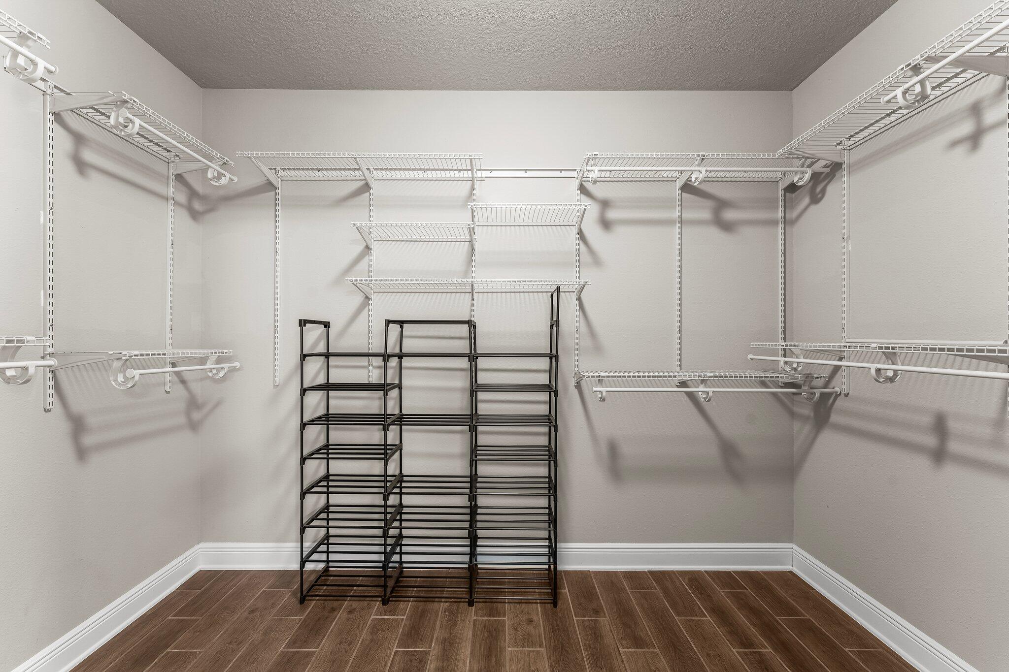 29 Buddy Lane Santa Rosa Beach, FL 32459 - Photo 38 of 47 a view of walk in closet with empty racks