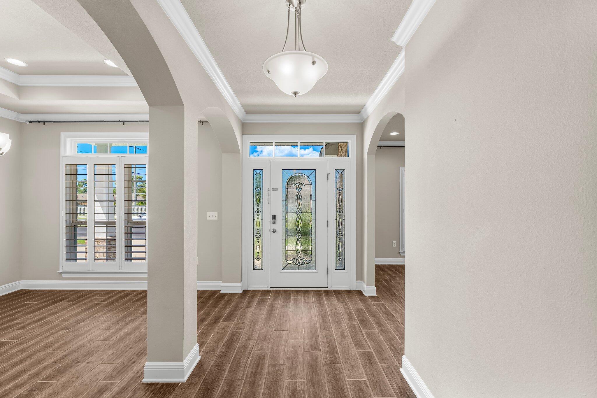 29 Buddy Lane Santa Rosa Beach, FL 32459 - Photo 6 of 47 wooden floor in an empty room with a window