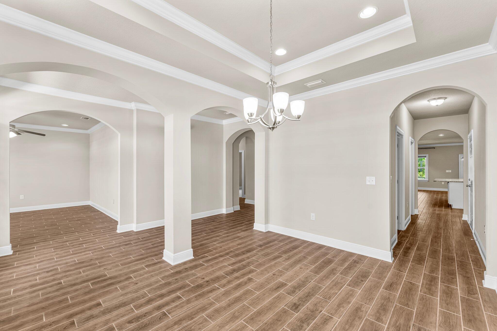 29 Buddy Lane Santa Rosa Beach, FL 32459 - Photo 8 of 47 a view of a hallway with wooden floor