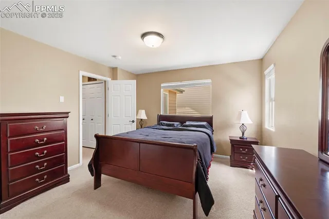 a spacious bathroom with a sink toilet and shower