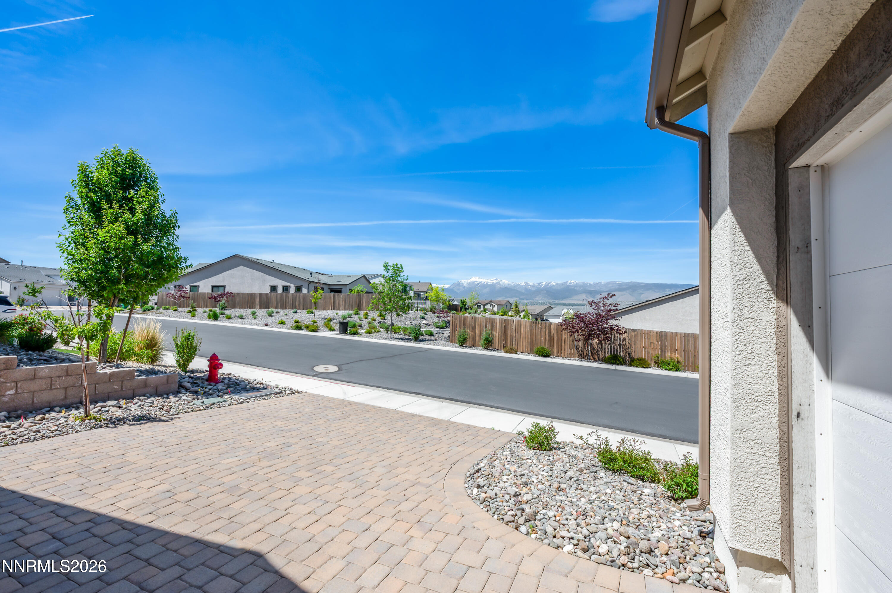 15024 Emerald Sunset Lane Reno, NV 89521 - Photo 12 of 73 a view of a bench in front of a building