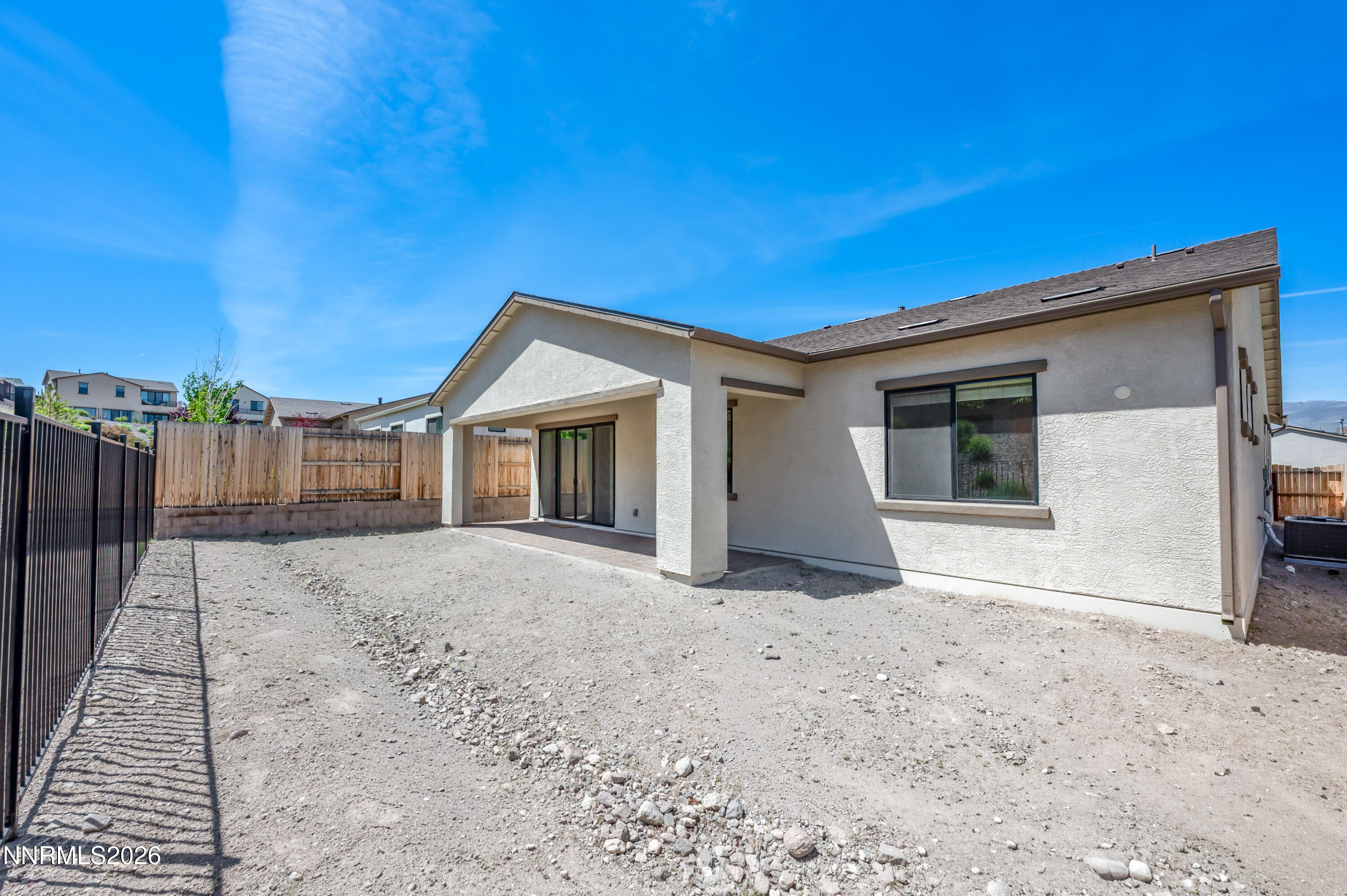 15024 Emerald Sunset Lane Reno, NV 89521 - Photo 53 of 73 a view of house with backyard and trees in the background