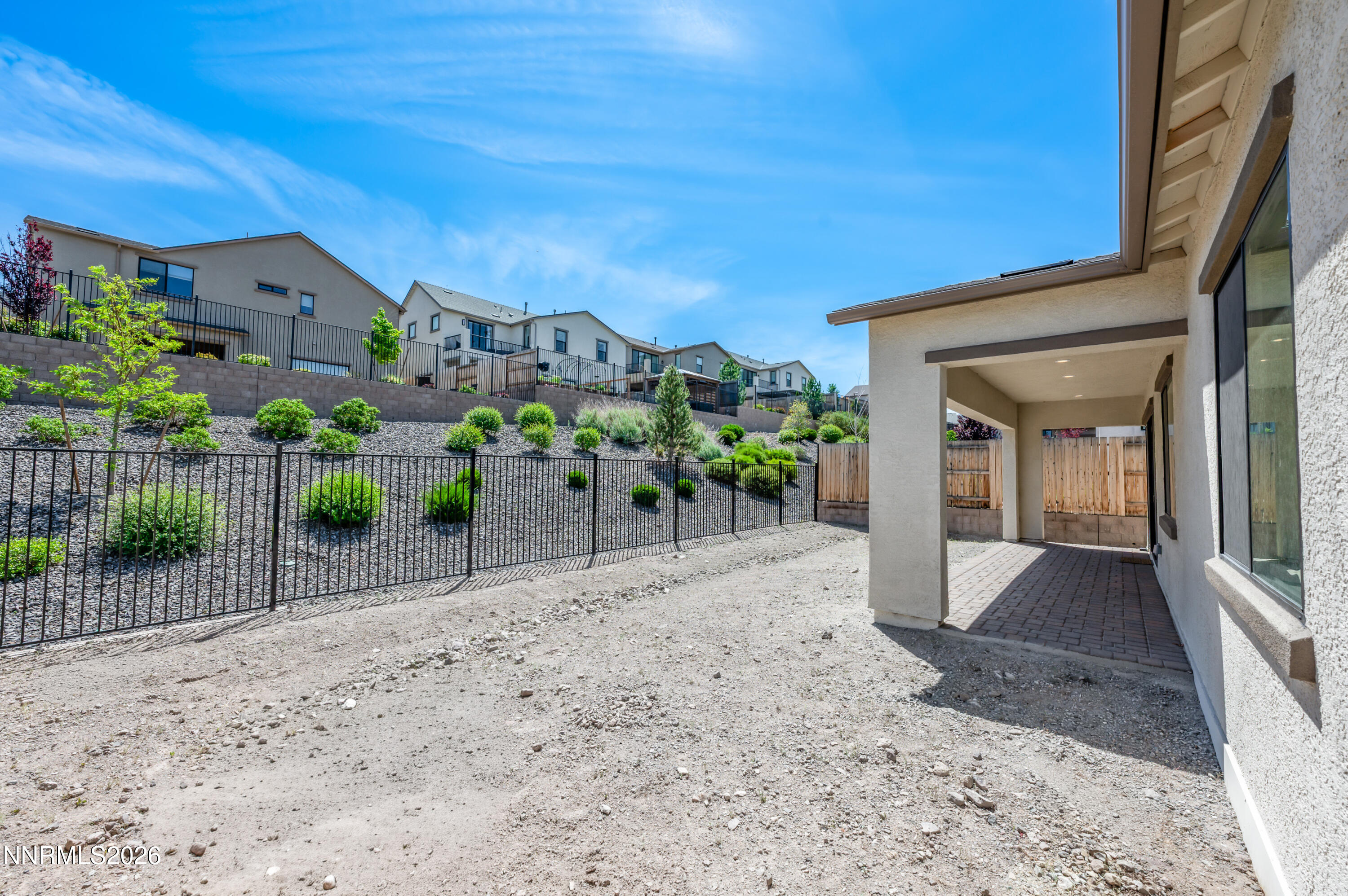 15024 Emerald Sunset Lane Reno, NV 89521 - Photo 54 of 73 a front view of a house with a yard