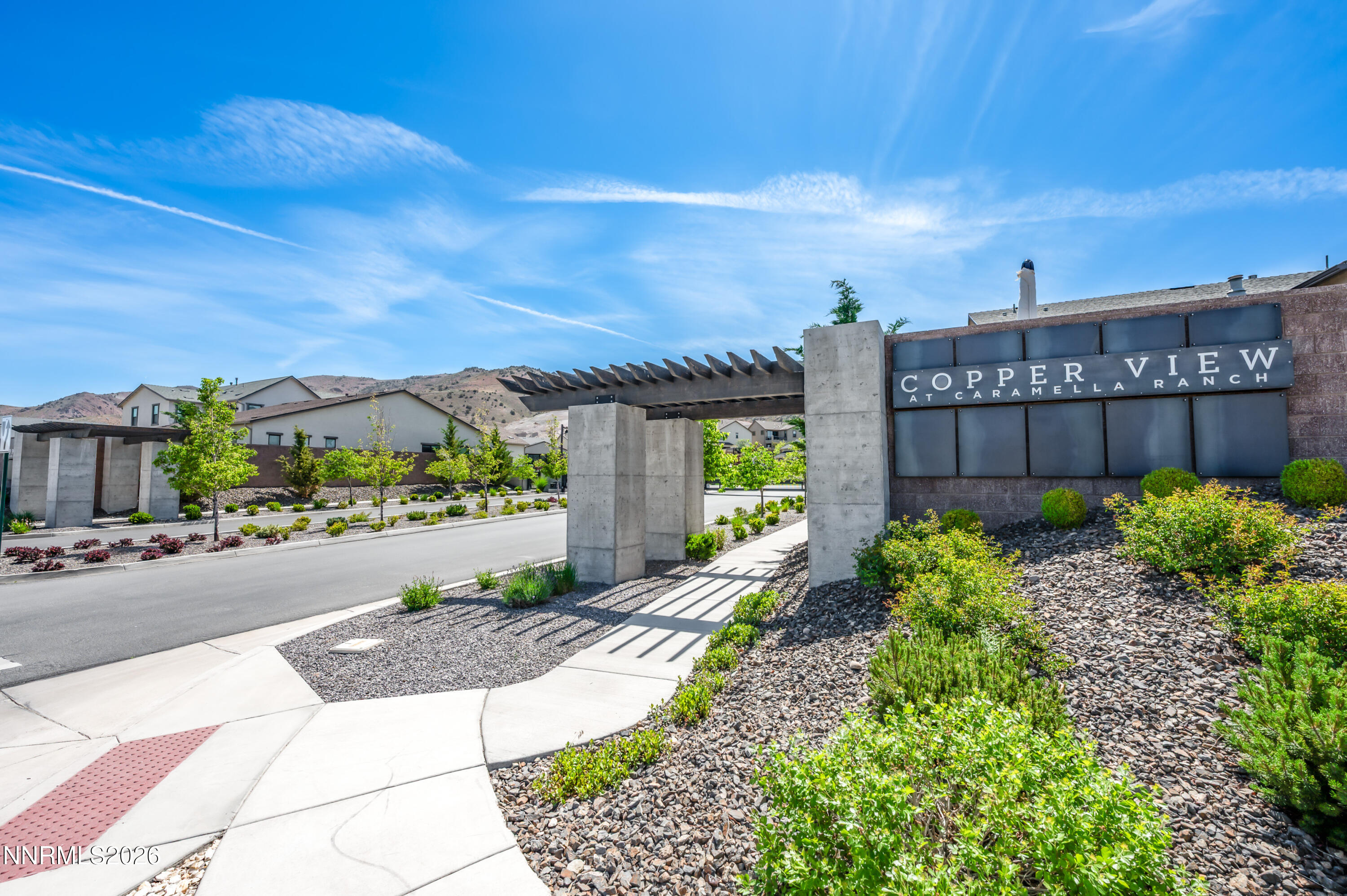 15024 Emerald Sunset Lane Reno, NV 89521 - Photo 65 of 73 a view of a garden with a building in the background