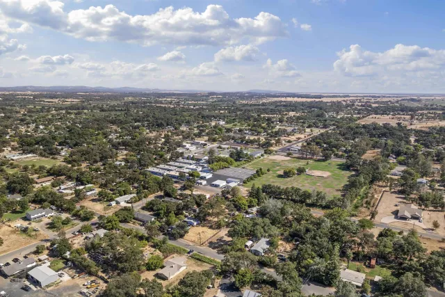 an aerial view of residential building and lake view