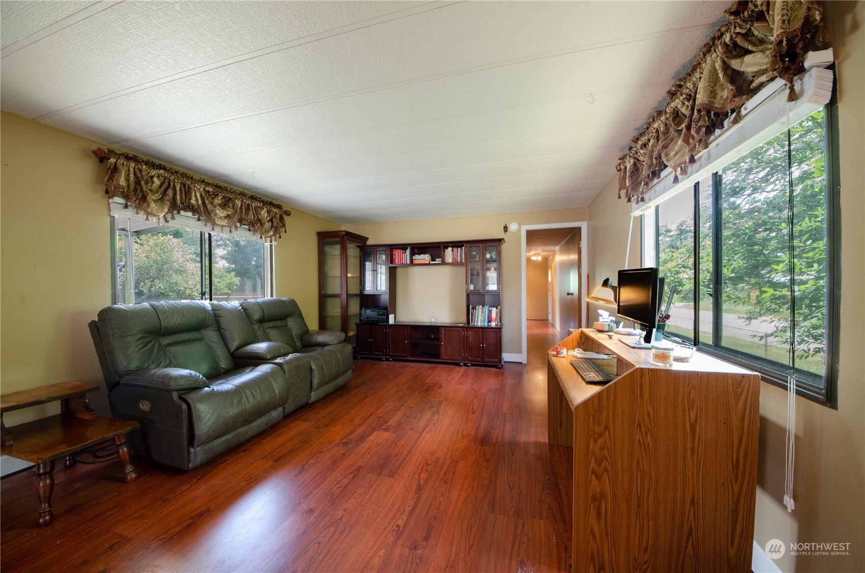 10319 184th Avenue Southwest Rochester, WA 98579 - Photo 4 of 14 a living room with furniture and a flat screen tv