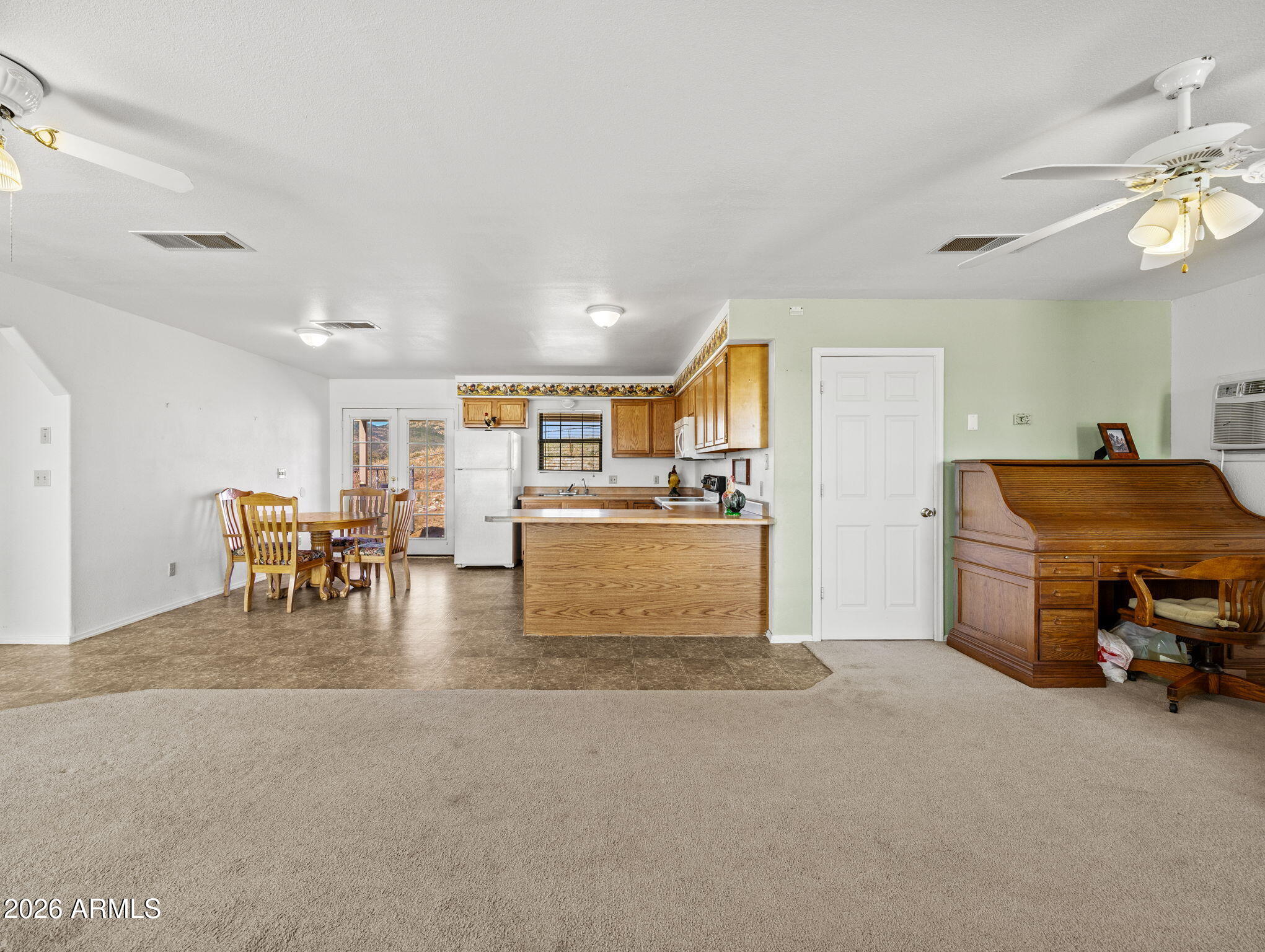 18420 Peeples Valley Road Peeples Valley, AZ 86332 - Photo 6 of 31 a living room with furniture and a table