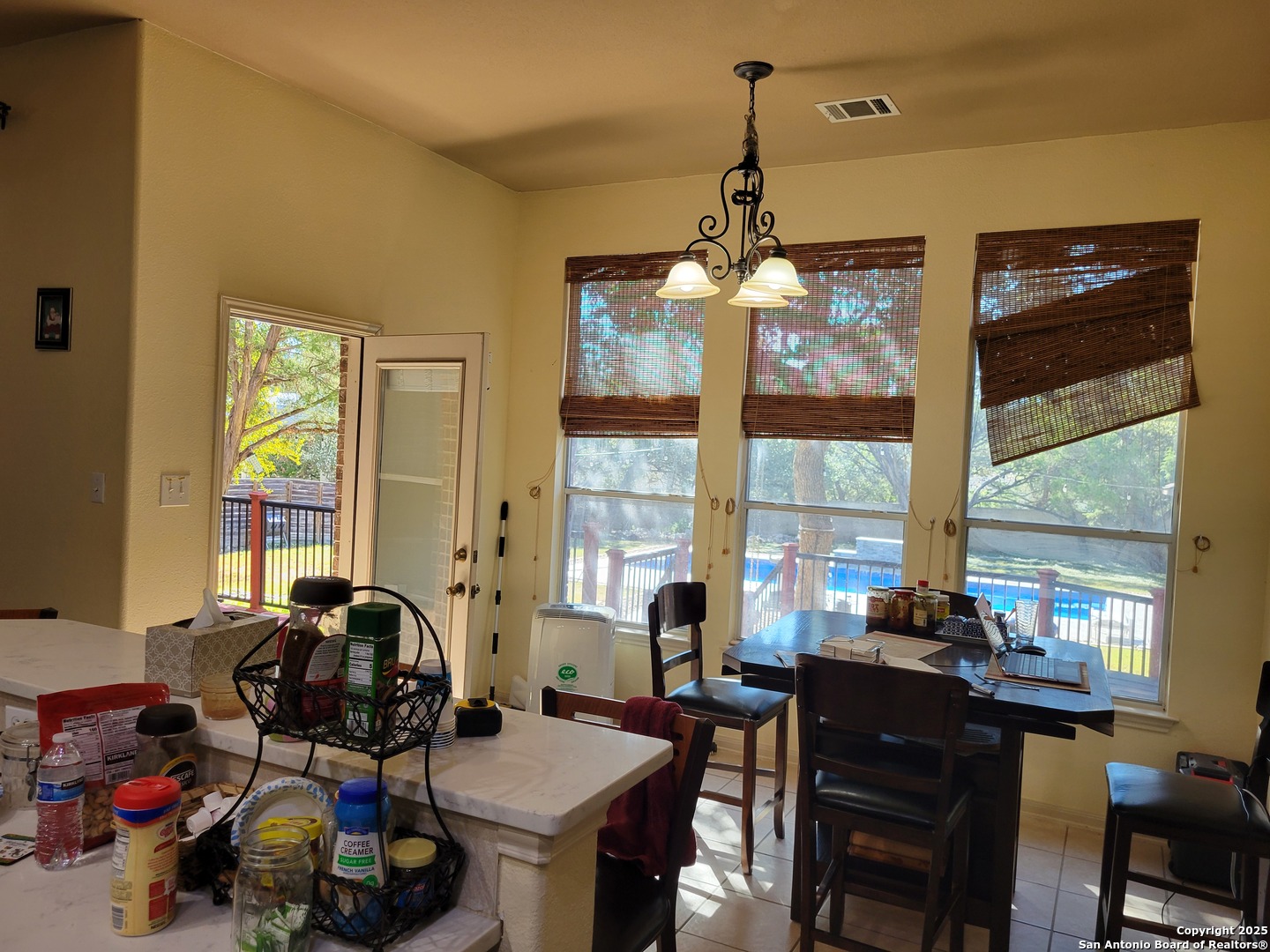 1722 Palmer San Antonio, TX 78260 - Photo 12 of 35 a view of a workspace with furniture and a window