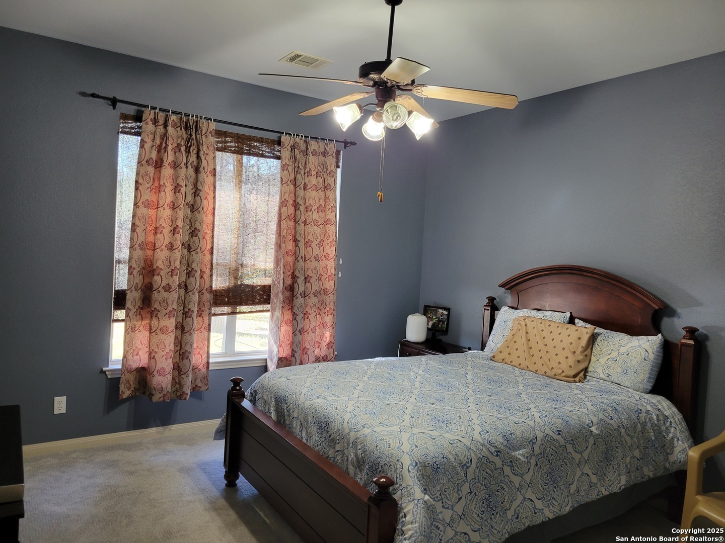 1722 Palmer San Antonio, TX 78260 - Photo 14 of 35 a bedroom with a bed and window