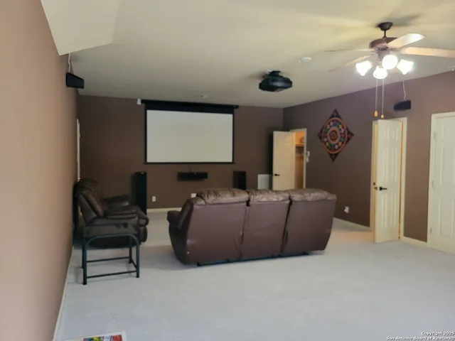 a room with furniture and gym equipment