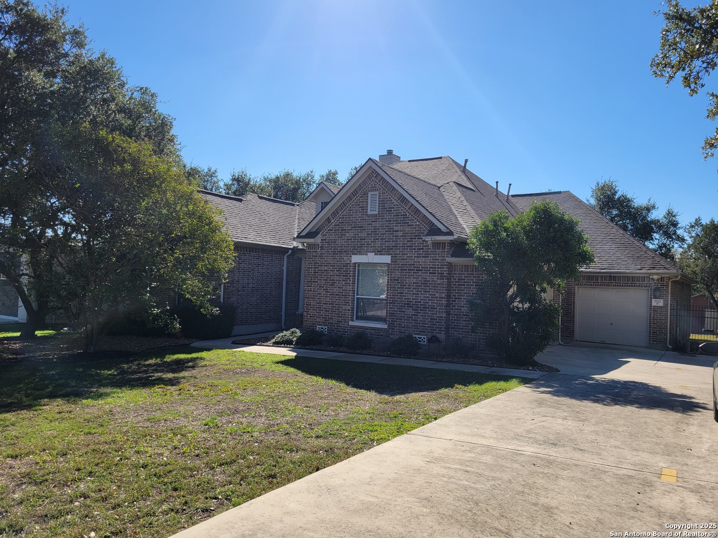 1722 Palmer San Antonio, TX 78260 - Photo 2 of 35 a house view with a garden space