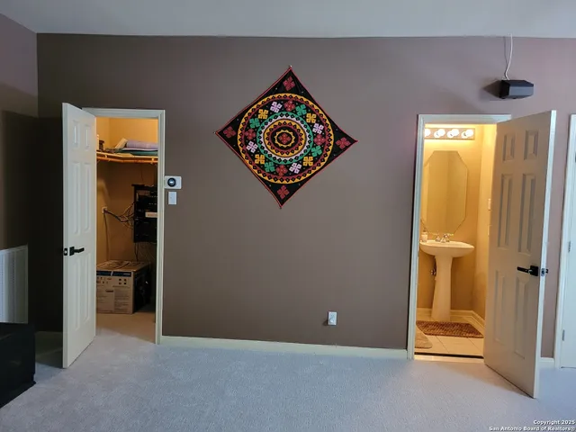 a kitchen with a sink a stove and cabinets