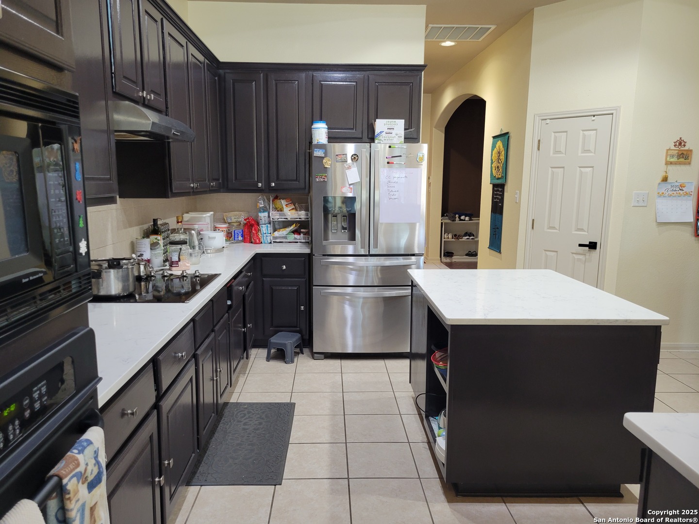 1722 Palmer San Antonio, TX 78260 - Photo 29 of 35 a kitchen with stainless steel appliances a refrigerator sink and microwave