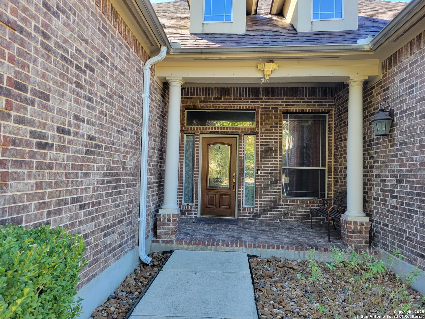 1722 Palmer San Antonio, TX 78260 - Photo 4 of 35 a front view of a house with a garden