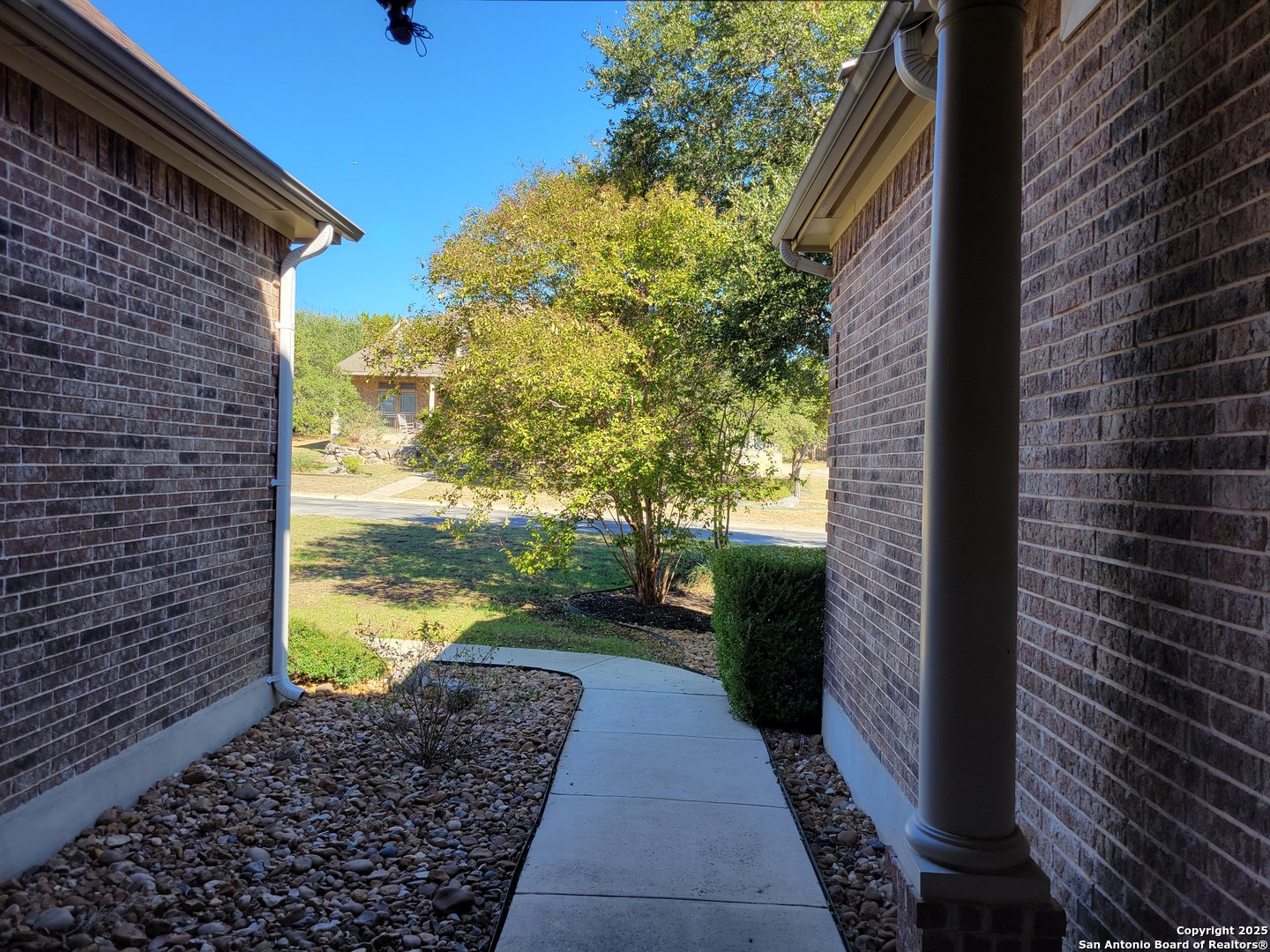 1722 Palmer San Antonio, TX 78260 - Photo 5 of 35 a pathway between two buildings