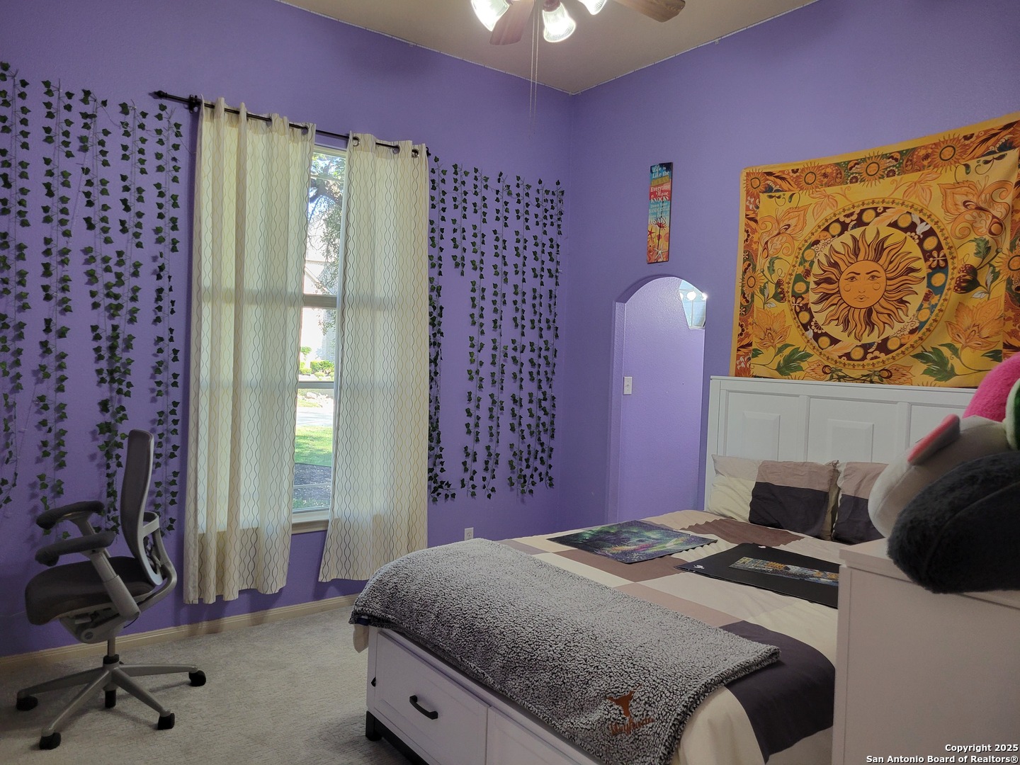 1722 Palmer San Antonio, TX 78260 - Photo 9 of 35 a bedroom with a bed and a chandelier