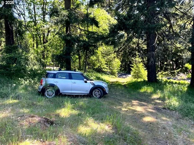 a view of swimming pool from a lake view