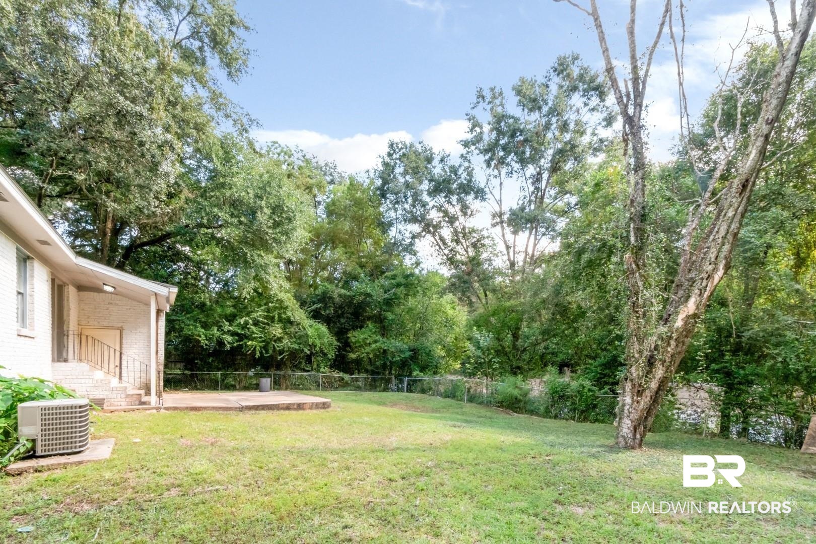 320 Vanderbilt Drive Mobile, AL 36608 - Photo 36 of 39 View of yard with a patio area and central air condition unit
