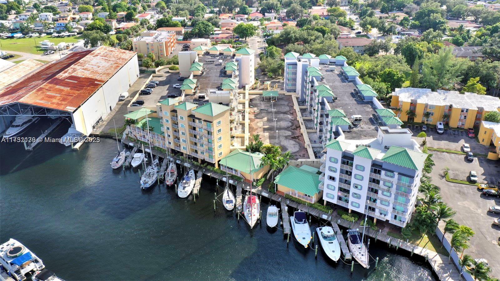 2475 Northwest 16th St Road, Unit 216 Miami, FL 33125 - Photo 1 of 16 an aerial view of a city