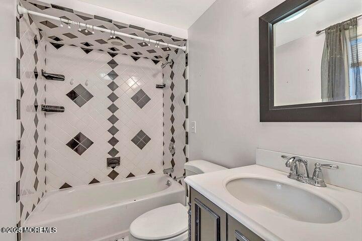 164 Jackson Street Matawan, NJ 07747 - Photo 9 of 27 a bathroom with a sink toilet a shower and a bathtub